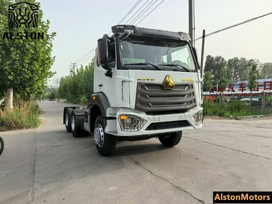Sinotruk Howo NX 6x4 camión tractor usado en venta en Tanzania. 371HP RHD 10 ruedas precio del motor remanufacturado.
