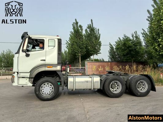 Sinotruk Howo NX 6x4 camión tractor usado en venta en Tanzania. 371HP RHD 10 ruedas precio del motor remanufacturado.
