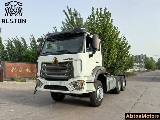 Sinotruk Howo NX 6x4 camión tractor usado en venta en Tanzania. 371HP RHD 10 ruedas precio del motor remanufacturado.