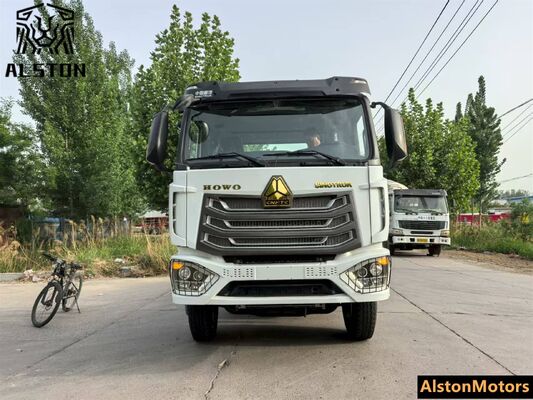 Sinotruk Howo NX 6x4 camión tractor usado en venta en Tanzania. 371HP RHD 10 ruedas precio del motor remanufacturado.