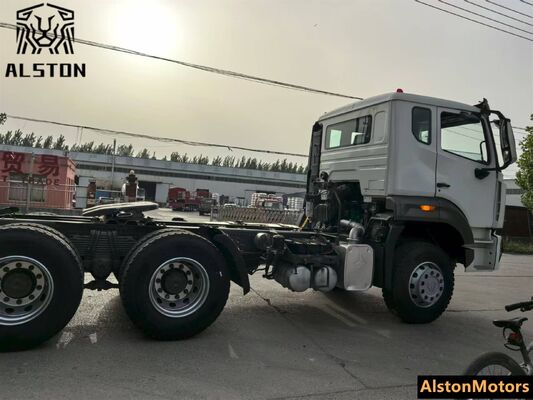 Sinotruk Howo NX 6x4 camión tractor usado en venta en Tanzania. 371HP RHD 10 ruedas precio del motor remanufacturado.