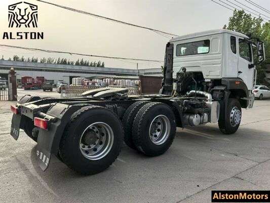 Sinotruk Howo NX 6x4 camión tractor usado en venta en Tanzania. 371HP RHD 10 ruedas precio del motor remanufacturado.
