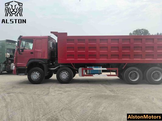 Camión volquete HOWO 375HP 8x4 usado a la venta en Guinea