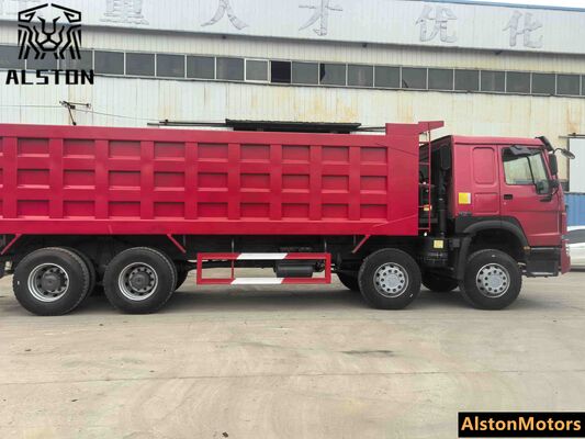Camión volquete HOWO 375HP 8x4 usado a la venta en Guinea
