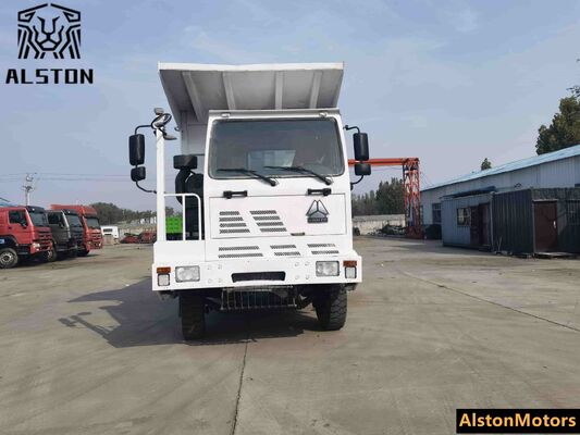Camión volquete minero HOWO 6x4 de fuselaje ancho usado en venta en Guinea