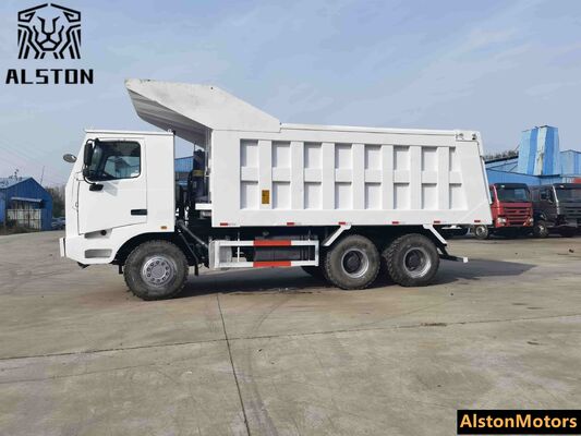 Camión volquete minero HOWO 6x4 de fuselaje ancho usado en venta en Guinea