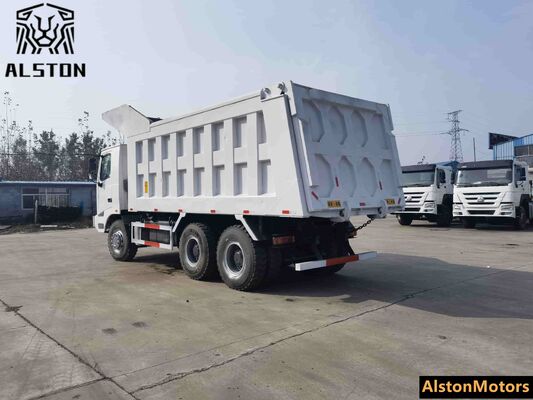 Camión volquete minero HOWO 6x4 de fuselaje ancho usado en venta en Guinea