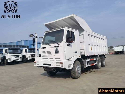 Camión volquete minero HOWO 6x4 de fuselaje ancho usado en venta en Guinea